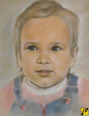 Chłopczyk w ogrodniczkach